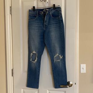 Levi’s 721 jeans with ripped knees
